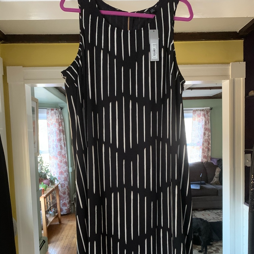 Black dress with white pattern.